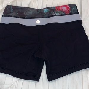 Black biker shorts with reversible band size 4.
